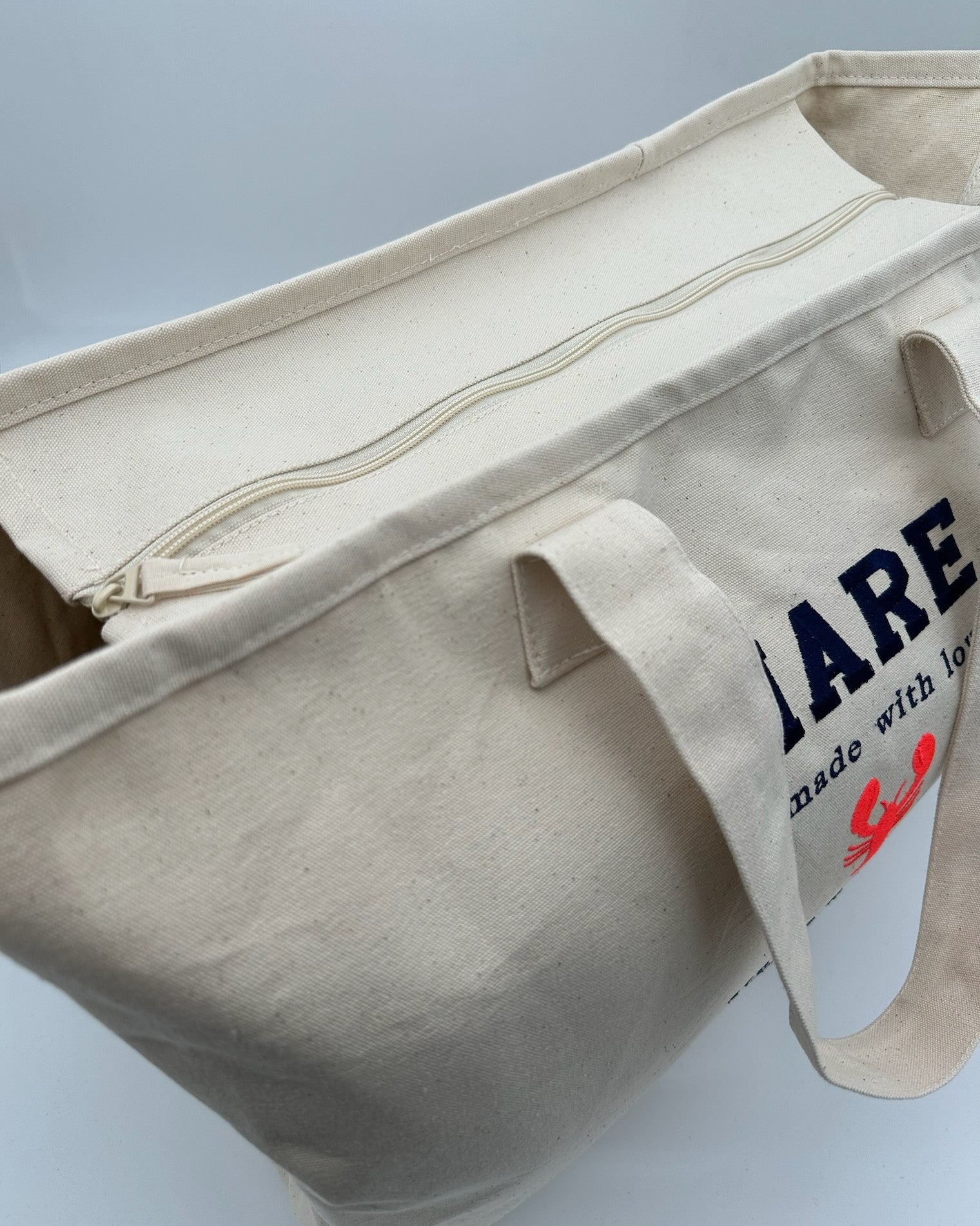 Ansicht von oben Reißverschluss Canvas Tote Bag Mare von studio x monaco